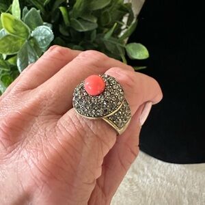 Heidi Daus Coral Stone Surrounded by Crystals on Brushed Bronze Ring Size 7 1/2.